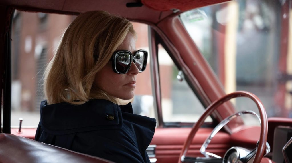 Elizabeth Banks wears sunglasses as she sits in a car in 'Call Jane.'